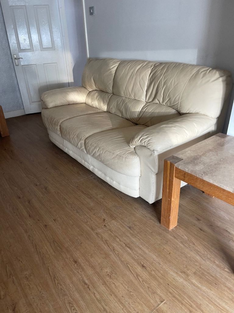 Cream Leather 2-Seater Sofa – Good Condition