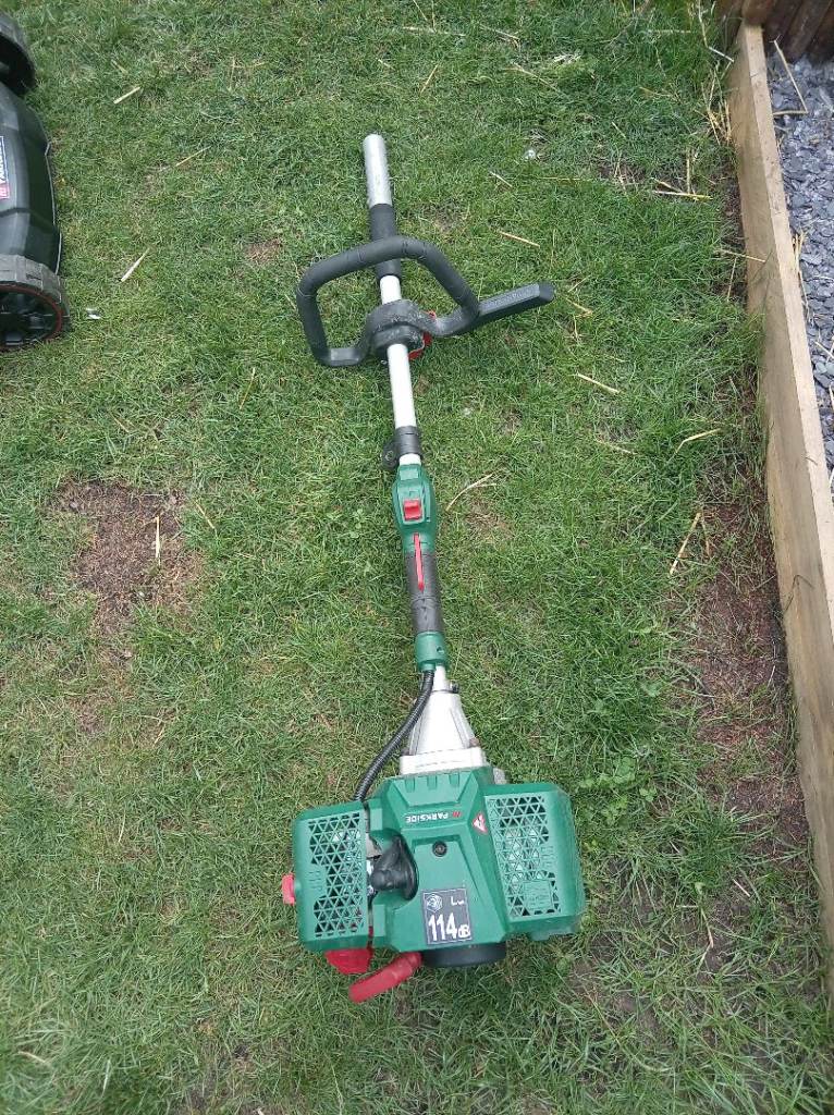 Parkside Petrol Lawnmower and 3 in 1 strimmer, chainsaw and hedgetrimmer. Will split. 