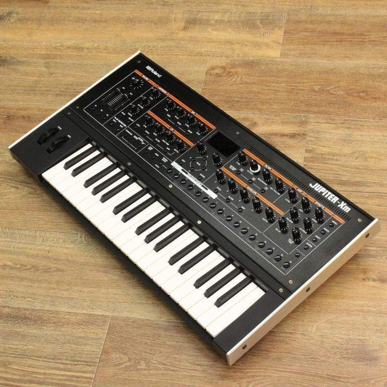 Roland Jupiter XM. Mint. Comes with box and leads