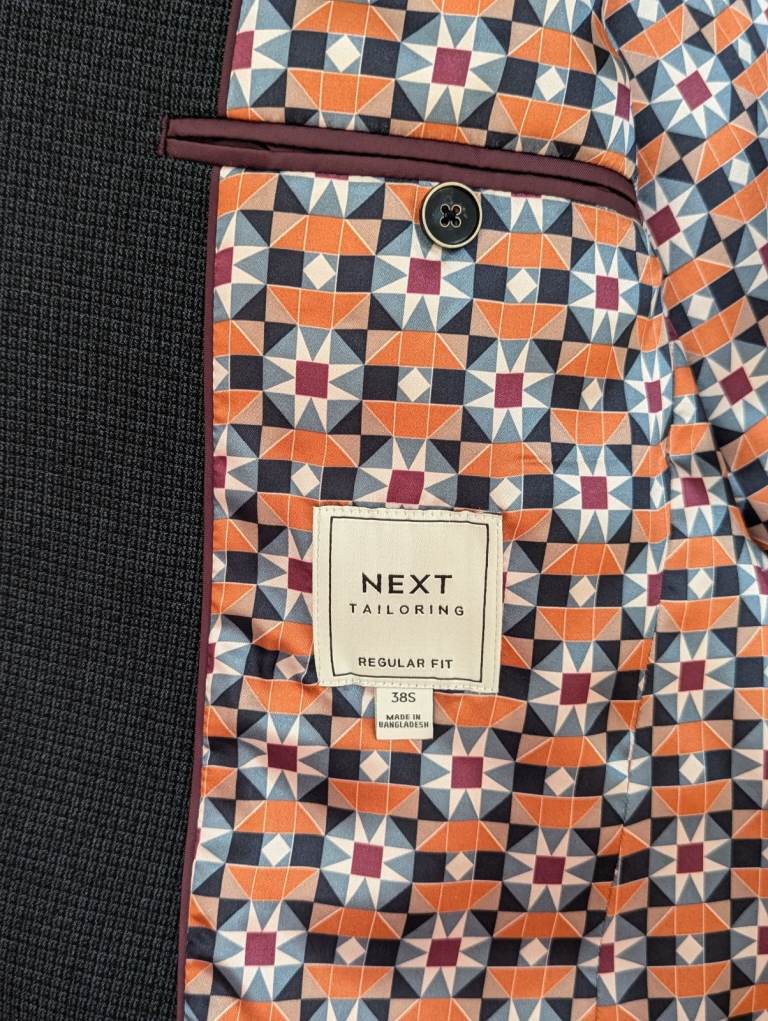 Men's suit from Next. Good as new. Jacket 38S trousers 32R