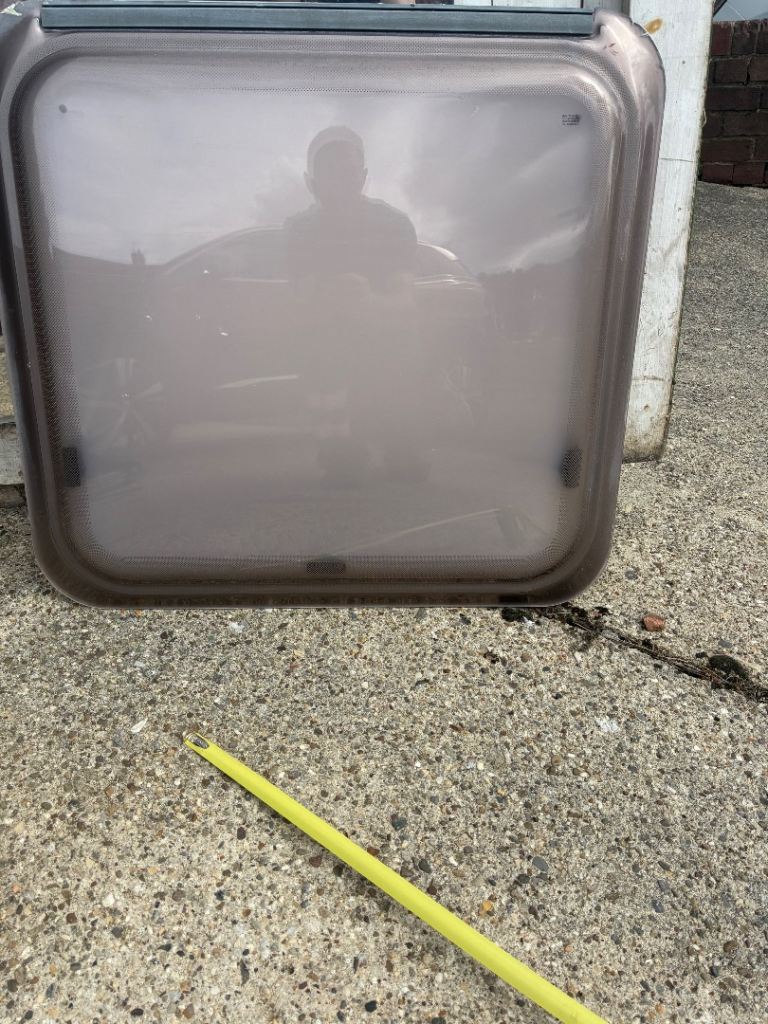 Camper toilet window 