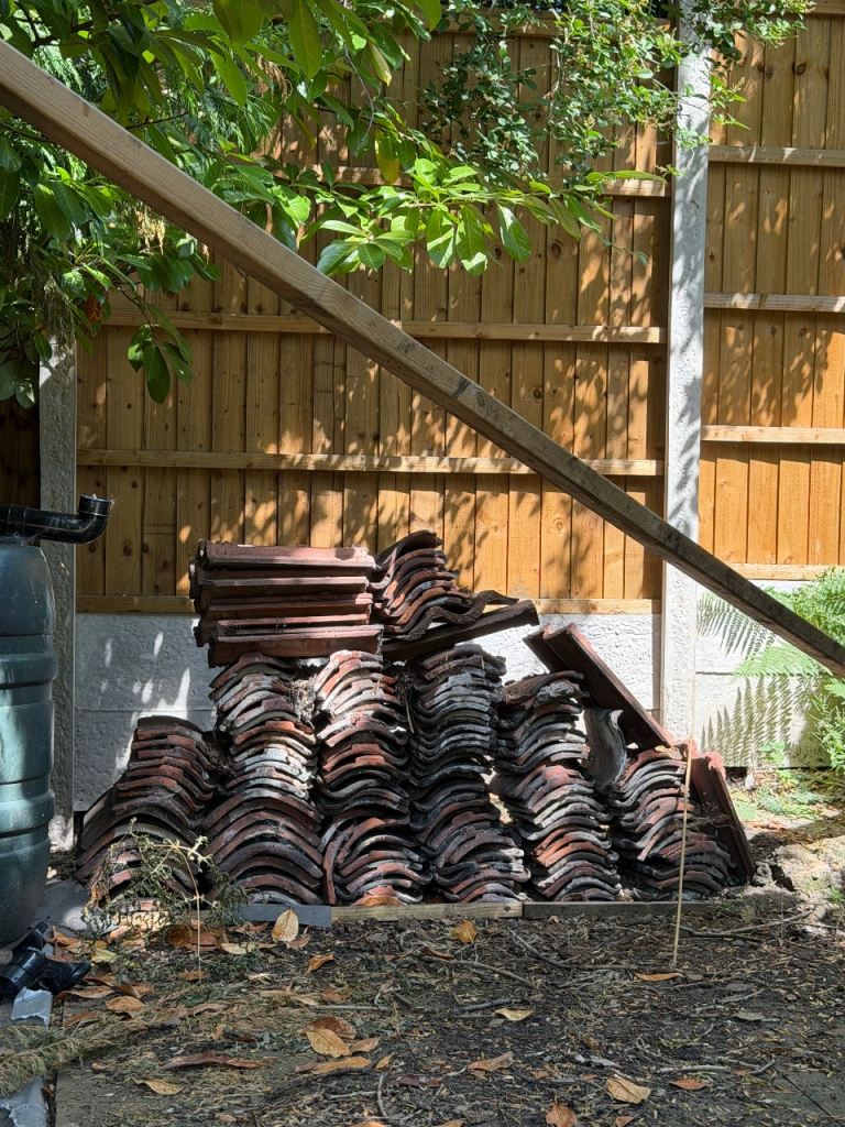 Pile of (~150-200) reclaimed roof tiles