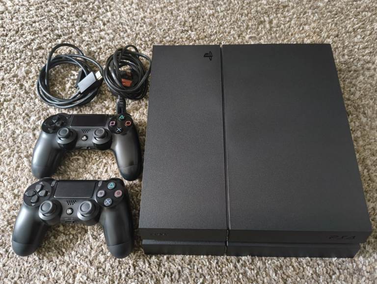 PlayStation 4 Pro Console with Two Controllers & Cables