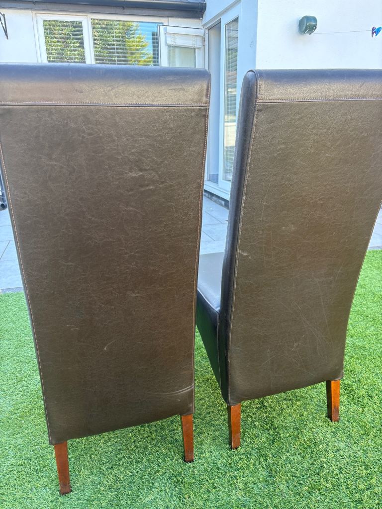 Brown Leather Chairs.