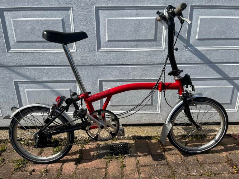 Brompton 6 speed fold-up bike with Brompton bag, spare pedals and carry case