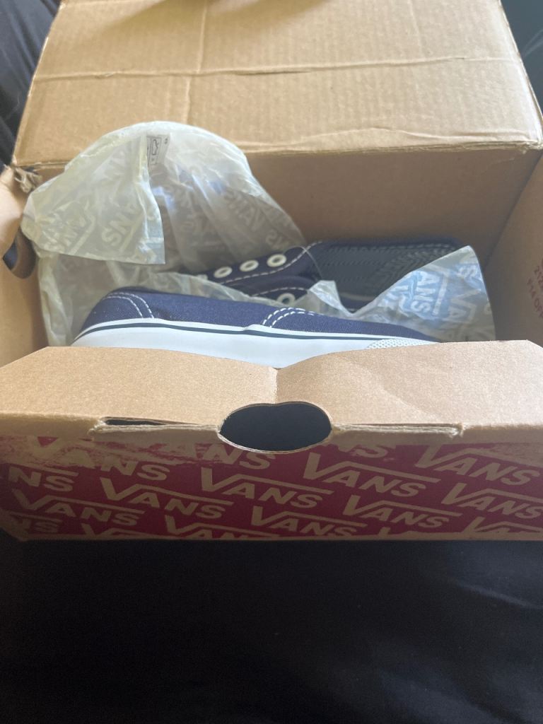 Kid shoes vans off the wall