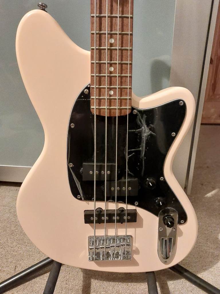 Bass guitar and bass amp combo