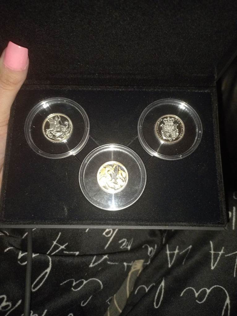 Sovereign three coins in case