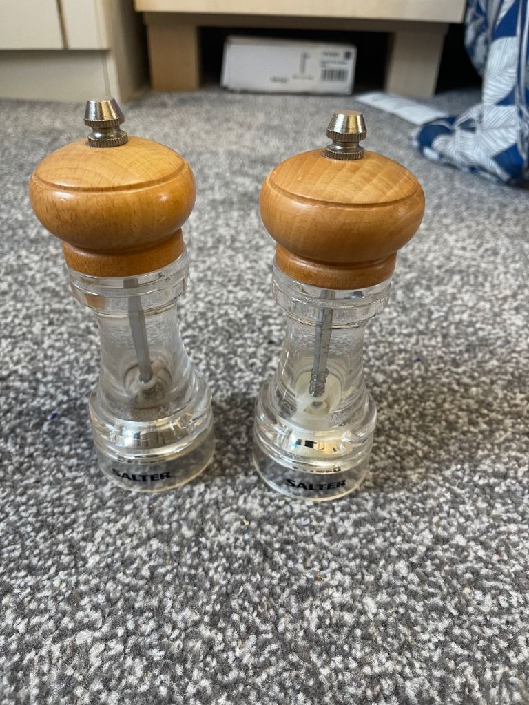 A pair of Salter Salt and Pepper hand grinders