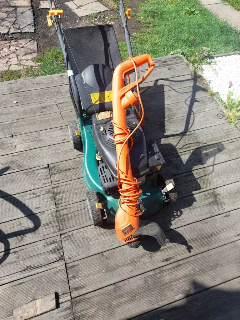 Petrol lawnmower and electric strimmer 