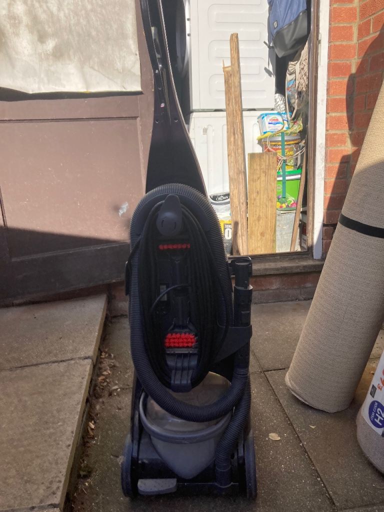 Bissel Powerwash Proheat carpet washer.