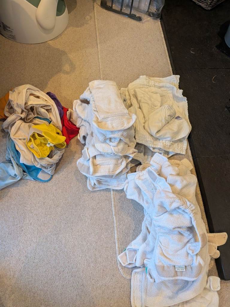 Large bundle of little lamb reusable nappies