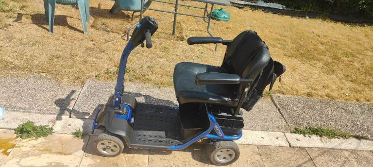 Rascal partner 4mph blue electric scooter new batteries used