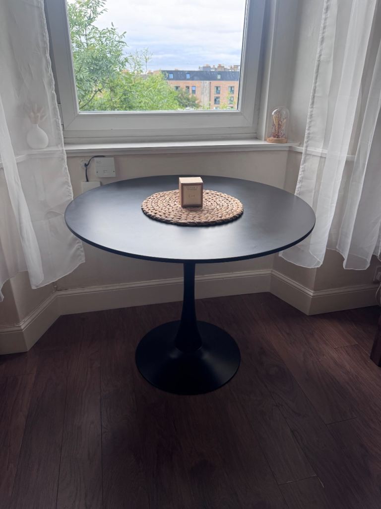 Black round dining table 