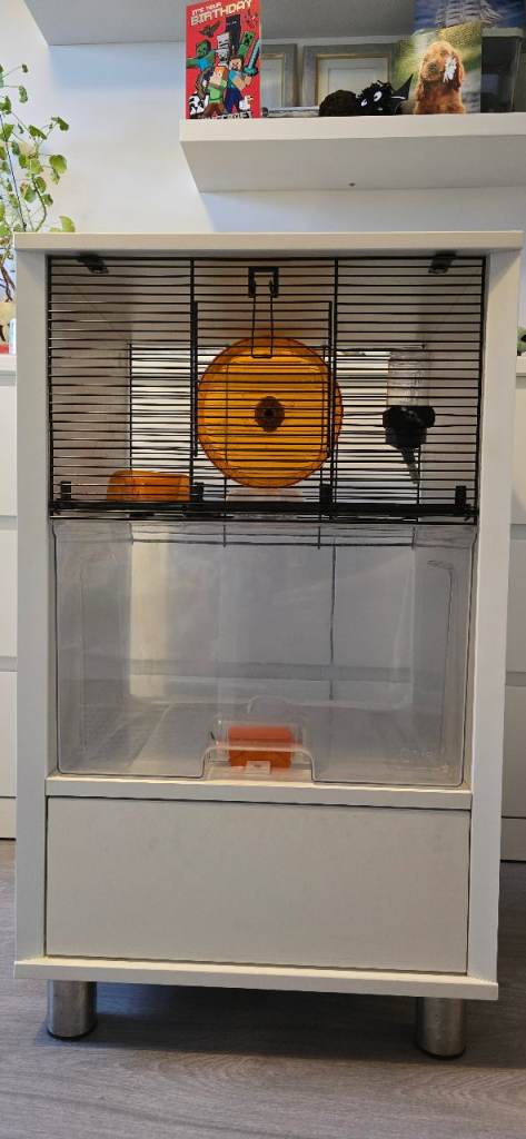 Gerbil or hamster cage with accessories