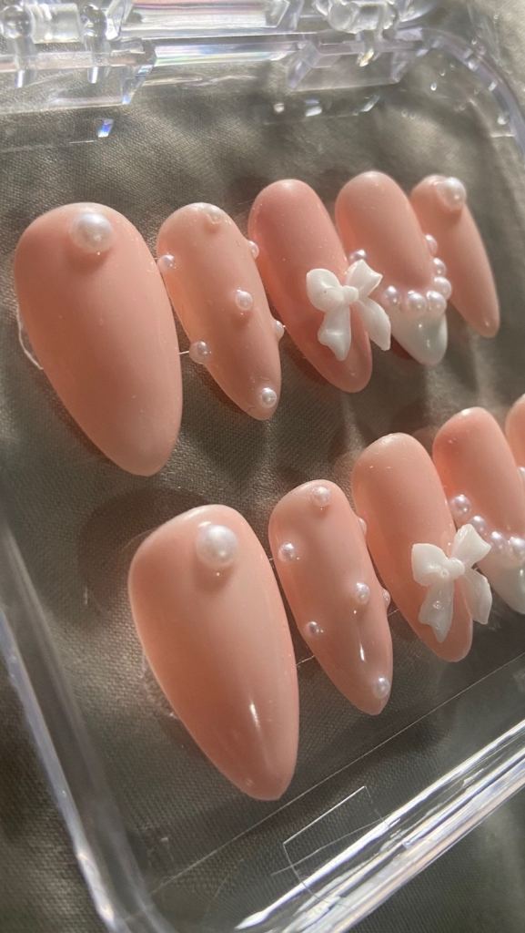 New Nude Almond Press-On Nails with Pearl & Bow Details