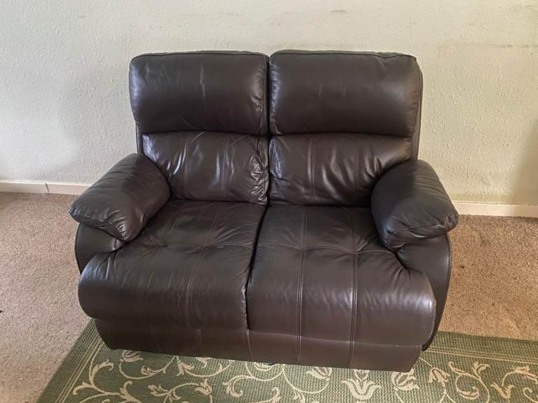 Two Chesterfield brown leather 3-seater sofas and one 2-seater