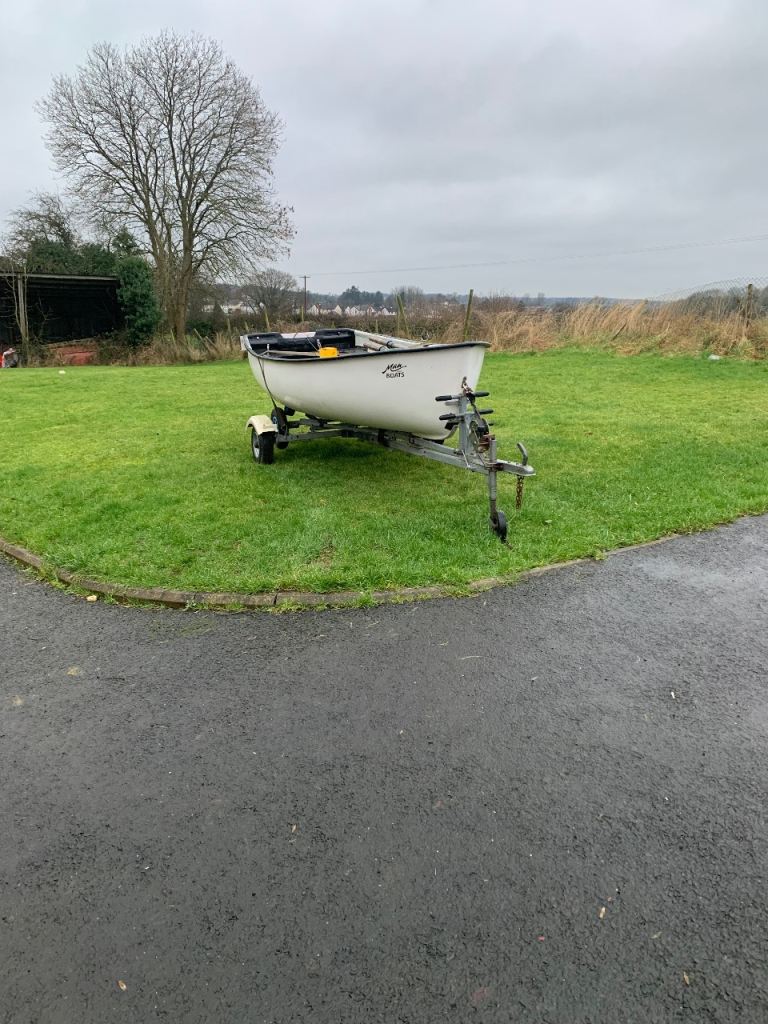 12 ft fibreglass boat trailer outboard and oars 