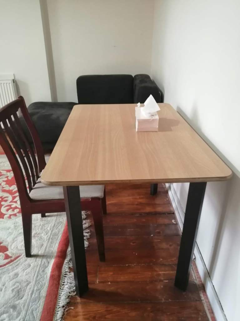 Small Dining Table with Wooden Top and Black Legs
