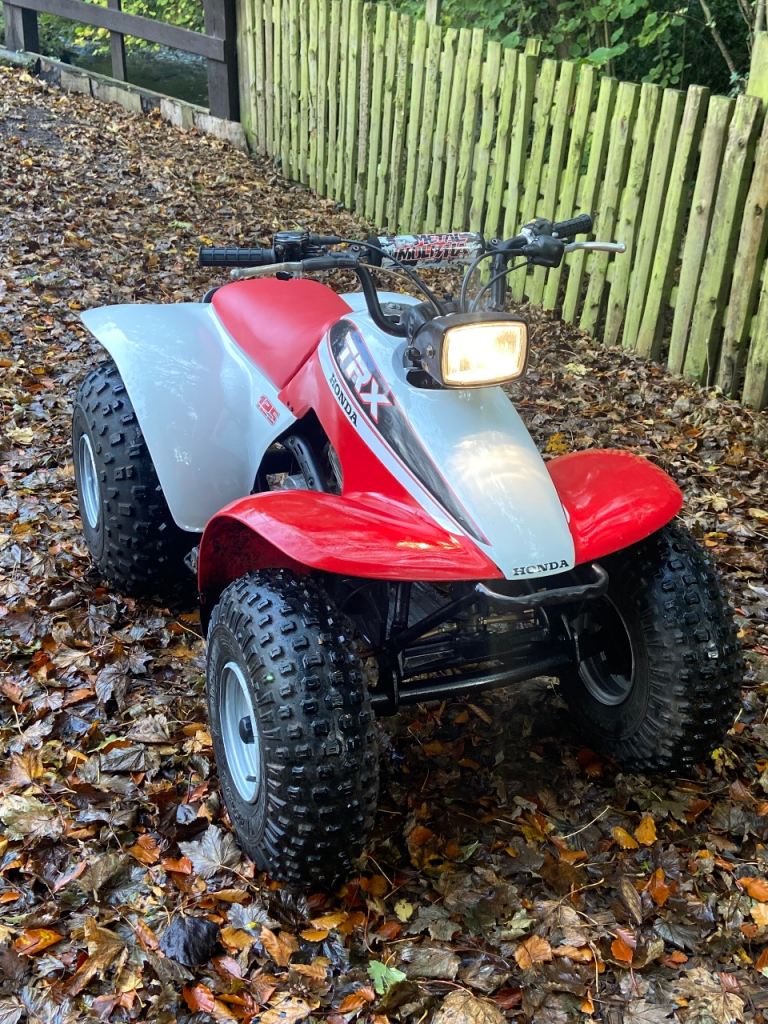 Honda trx 125 quad big red 
