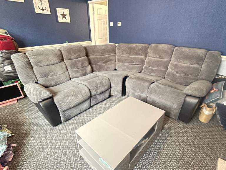 Grey L shaped two piece sofa recliner 