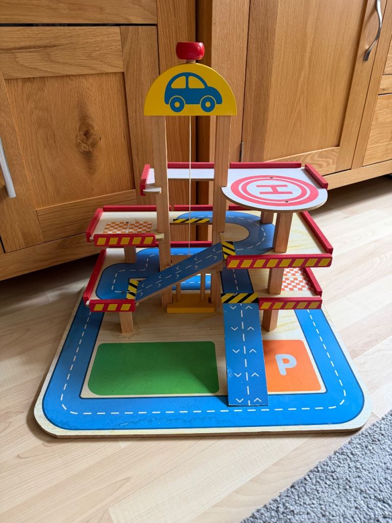 Toy wooden garage in good used condition 