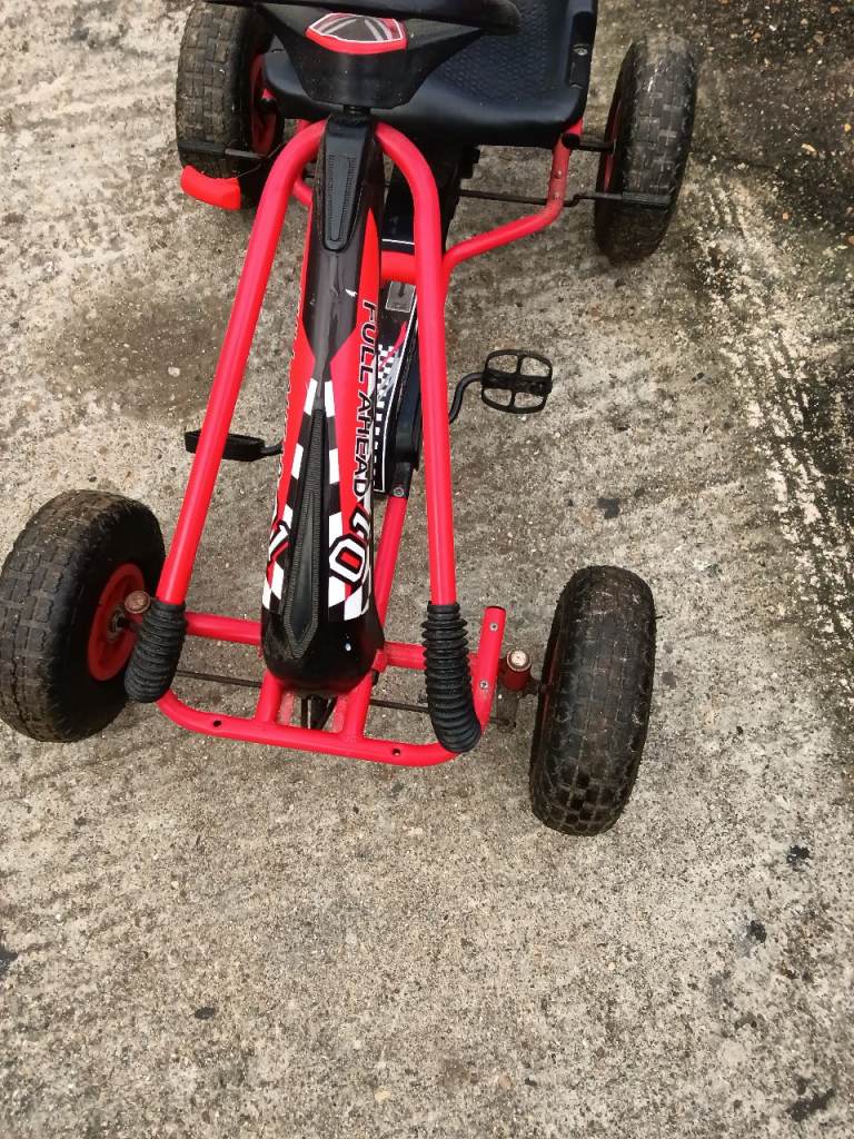 Childs pedal car forward and reverse