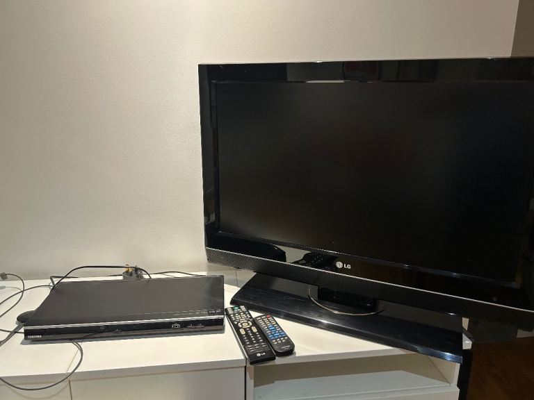 LG 32 in Flat Screen TV with Toshiba DVD Player and Remotes