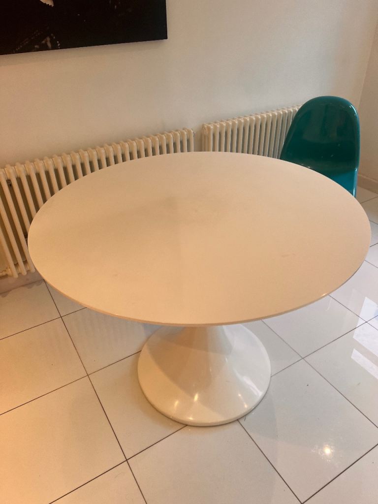 Round white designer dining table 
