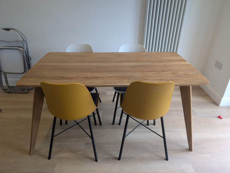 Solid mango wood dining table (chairs not included)