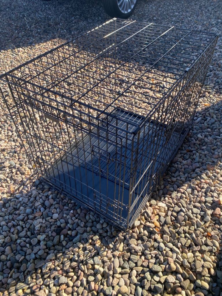 Dog crate, hardly used, 2 doors, fully collapses