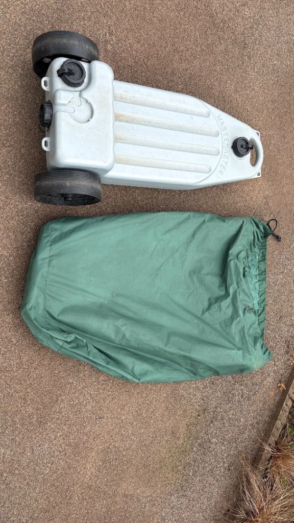 Caravan waste master water carrier