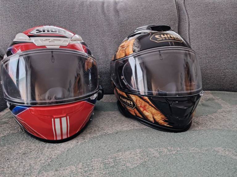 Two Shoei helmets