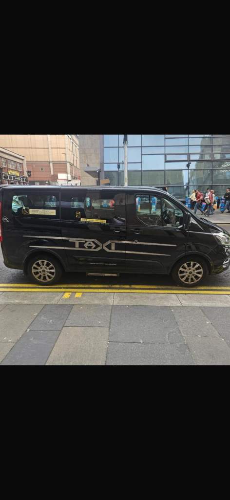 Black taxi and plates 