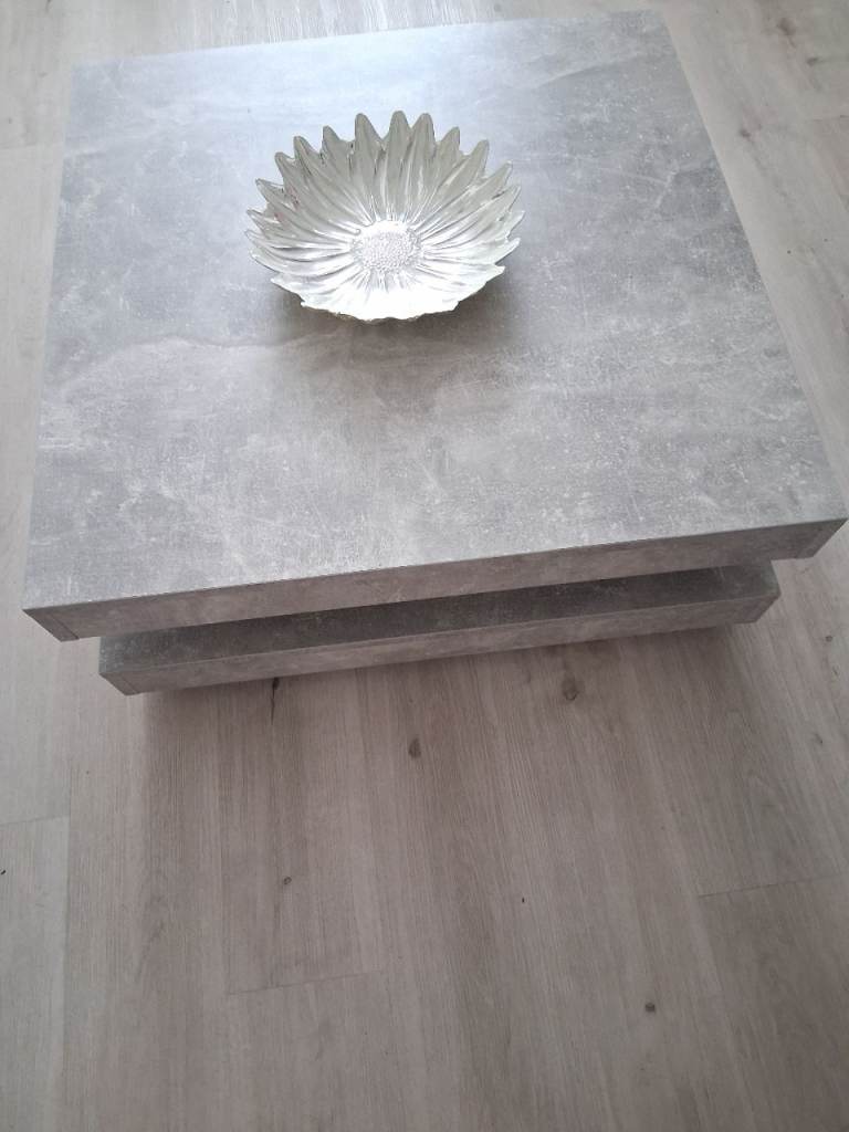 coffee table with swivel mechanism