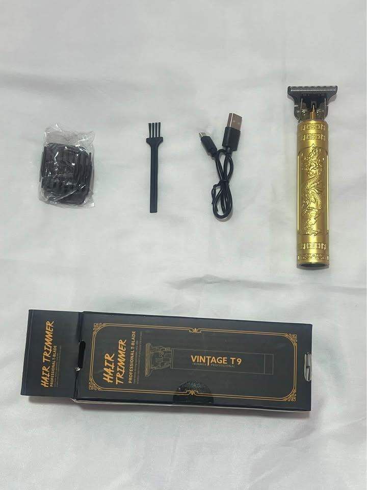VINTAGE GOLD TRIMMER BRAND NEW WITH ATTACHMENTS AND CABLE
