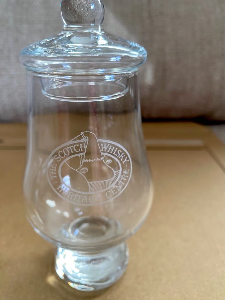 Various Scotch Whisky collectibles. Nosing glasses, water jugs etc. 