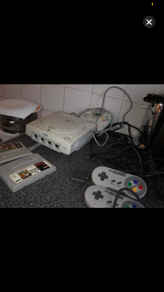 Dreamcast with leads, 1 controller + 2 Super Nintendo controllers and 2 SN games