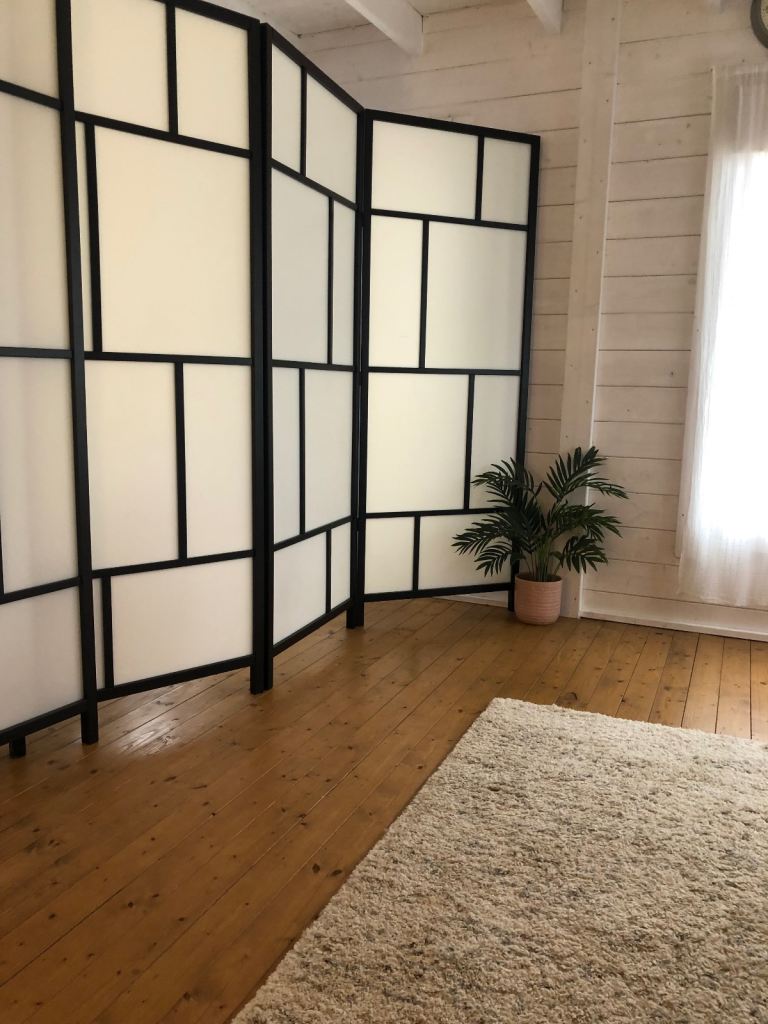 Two IKEA room divider screens