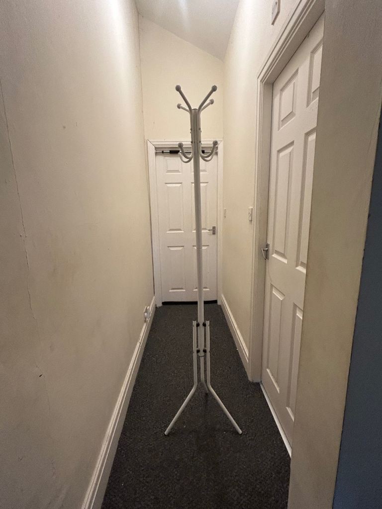 White coat and hat stand