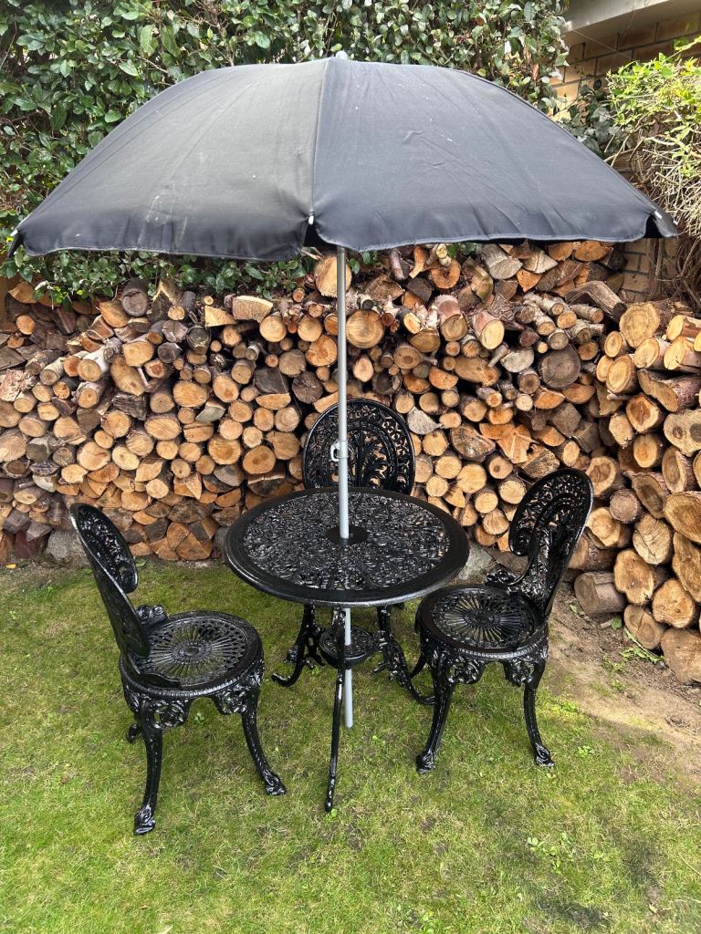 Beautiful black bistro table and chairs