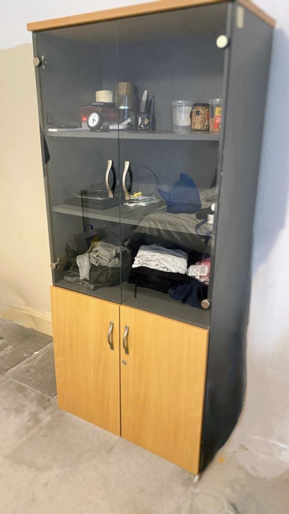 Glasses and wood wardrobe or office cabinets 