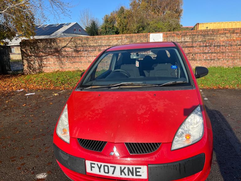 Mitsubishi colt 2007 red 3 door low miles 6 months mot, some history cheap tax and insurance