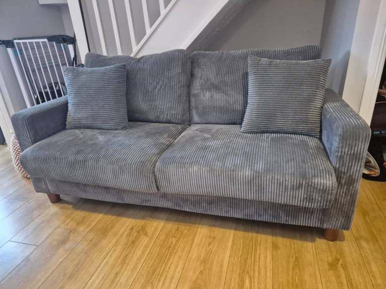 Grey Corduroy Two-Seater Sofa with Cushions – Good Condition