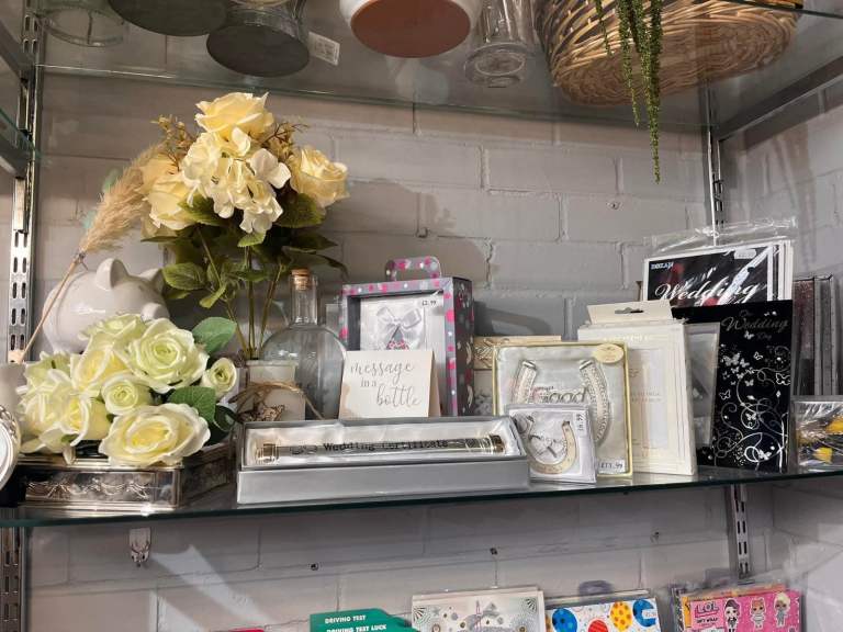 Adjustable glass shelving 