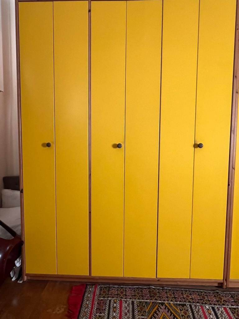 Lovely Yellow Wardrobe with folding doors (Two available)