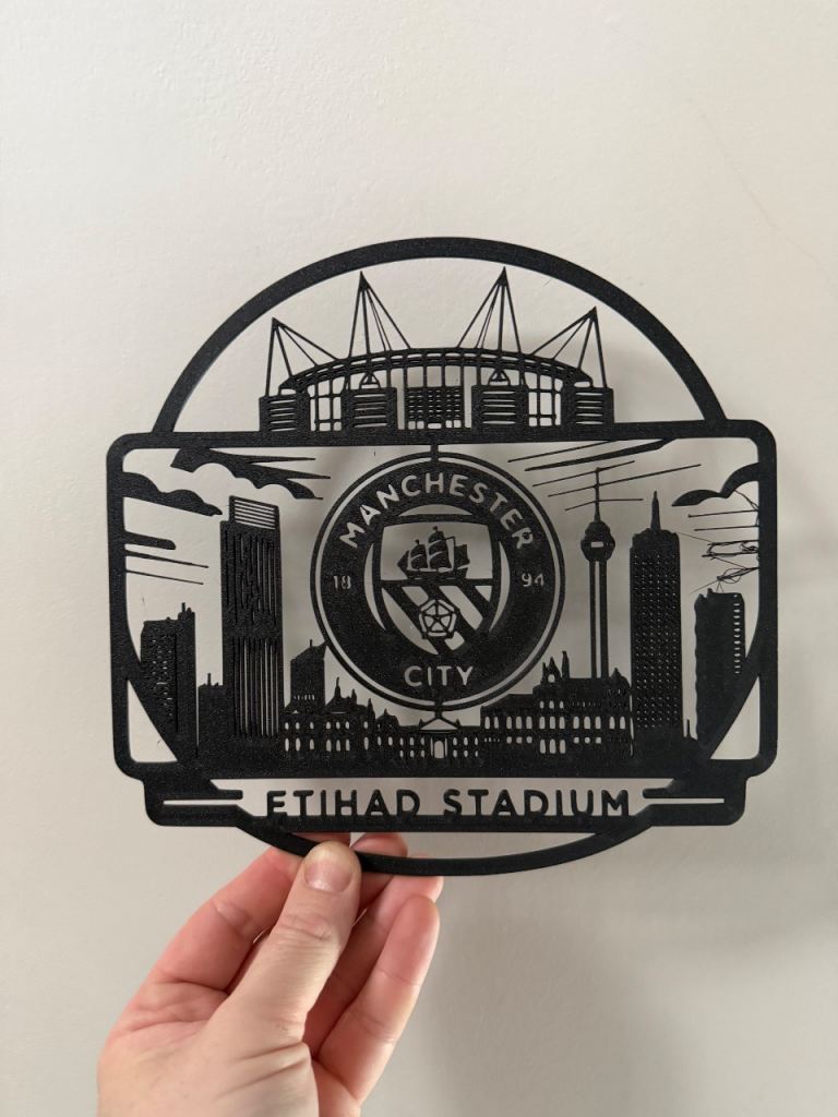 Manchester City FC and city centre building wall art