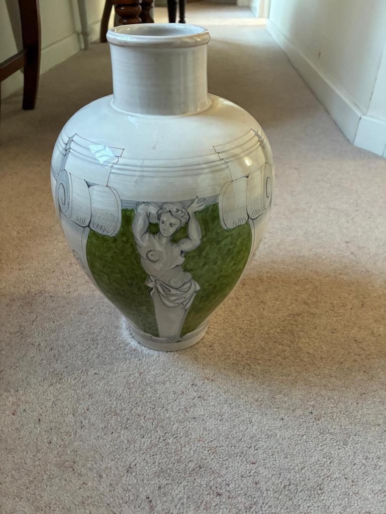 Vintage Art Deco style ceramic vase with classical figure design.