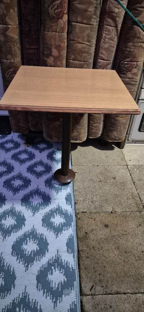 Table with leg in the floor mounted for caravan motorhome camper boat.
