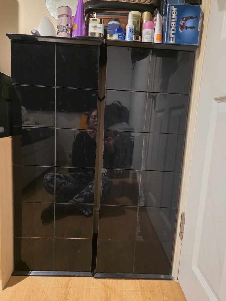 image for Black tall chest of drawers 